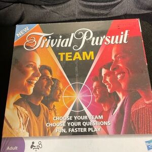 Hasbro Trivial Pursuit Team Game - Red, Orange, Black